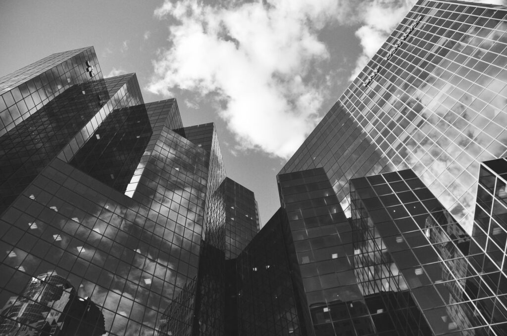 black and white photo of tall buildings